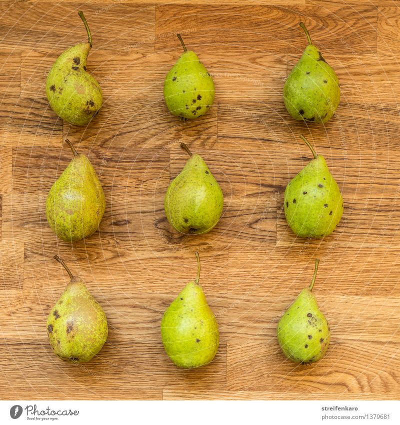 Nine pears, regularly arranged on a wooden table Food Fruit Pear Nutrition Eating Organic produce Vegetarian diet Diet Slow food Healthy Kitchen Thanksgiving