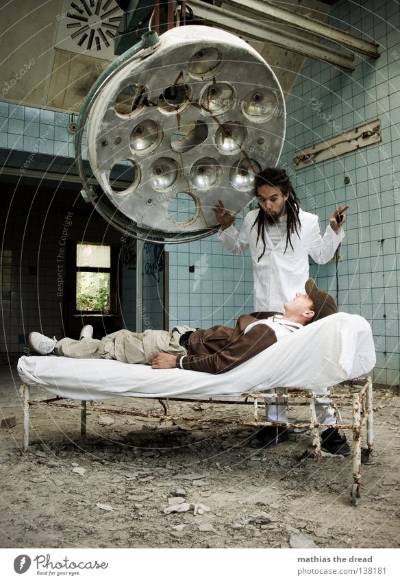 WHAT A BEAUTIFUL PLACE WE HAVE HERE! Doctor Cutlery Tool White Apron Dreadlocks Operation Hair and hairstyles Derelict War Destruction Trash Building rubble