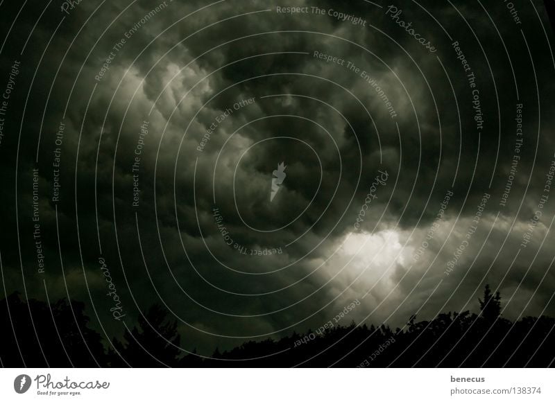 derangement Dark Clouds Storm Low pressure zone Ghosts & Spectres  Dreary Bad weather Dark clouds Ray of hope Black Dark gray Gray Cloud formation Sky