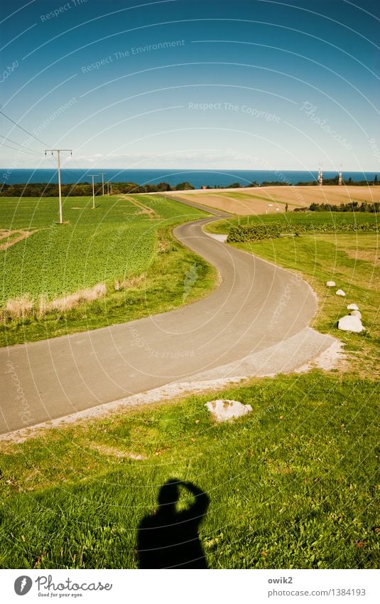 Watch curve Electricity pylon Environment Nature Landscape Water Cloudless sky Horizon Beautiful weather Grass Meadow Field Hill coast Baltic Sea Island Rügen