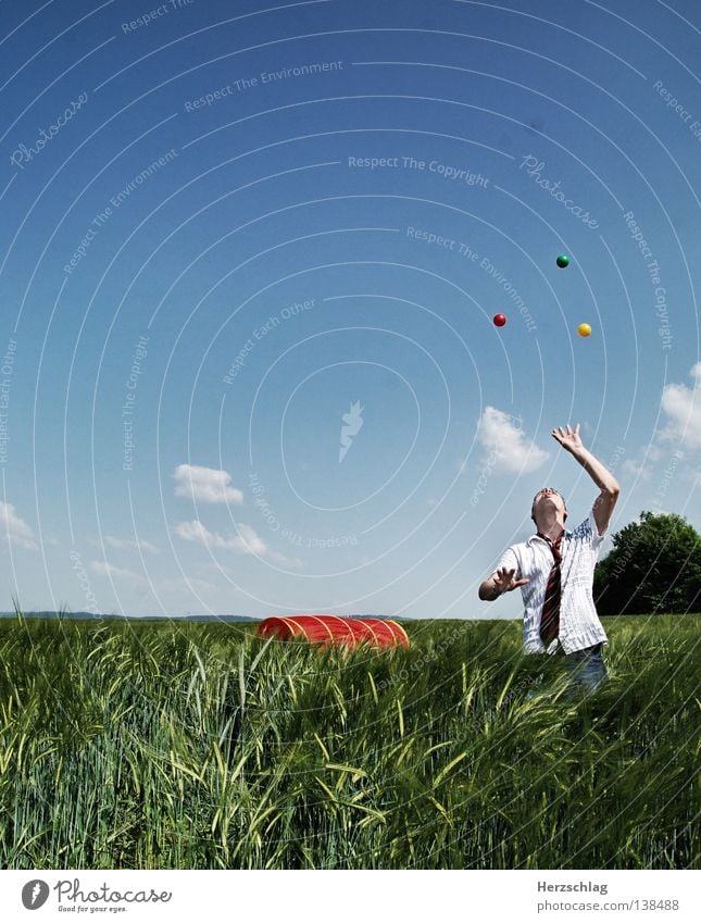 Juggles Red Yellow Green Round Hand Tie Field Clouds Summer Ball Blue Joy Colour Sphere Sky Electricity Clown
