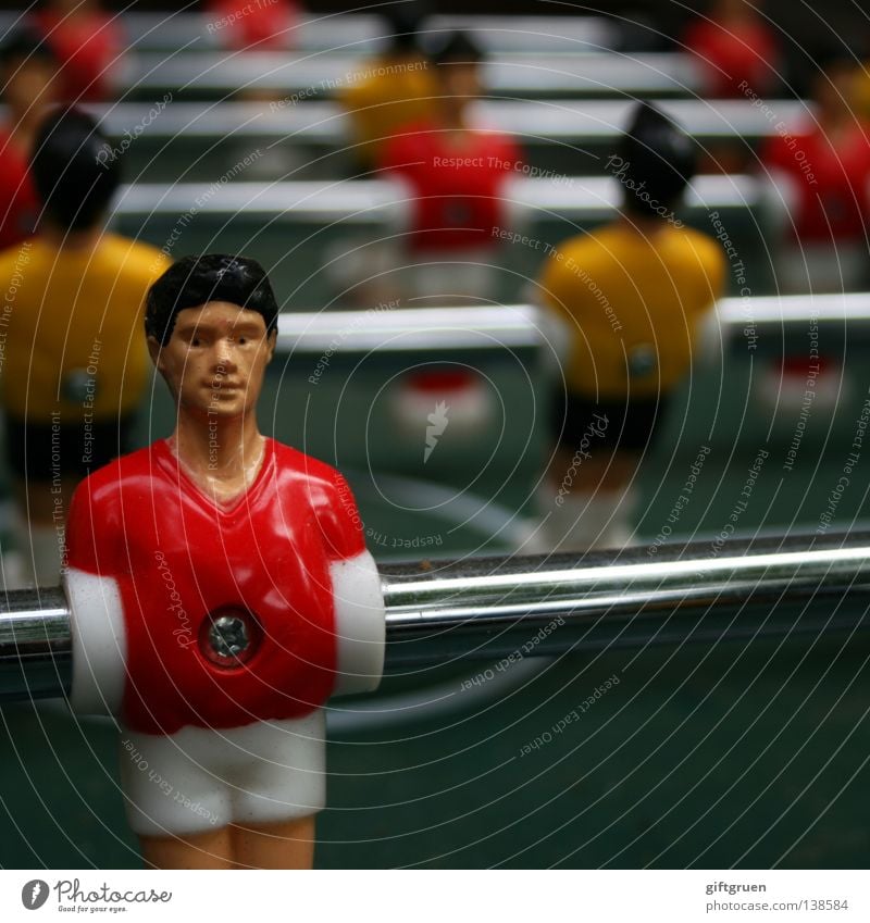 summer fairy tale revisited? Table soccer Jersey Classification Playing field Rod Colour photo Shallow depth of field Cross-head screw Screwed on tight Red