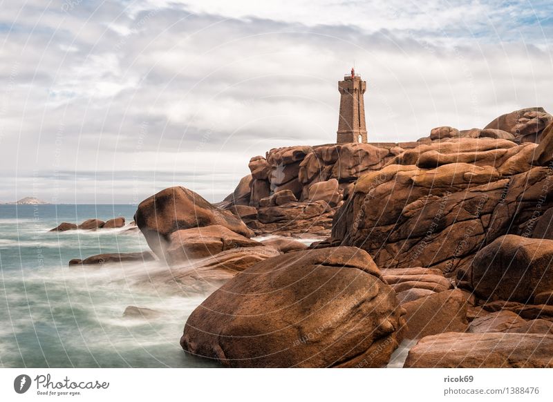 Atlantic coast in Brittany Relaxation Vacation & Travel Nature Landscape Clouds Rock Coast Ocean Lighthouse Building Architecture Tourist Attraction Stone