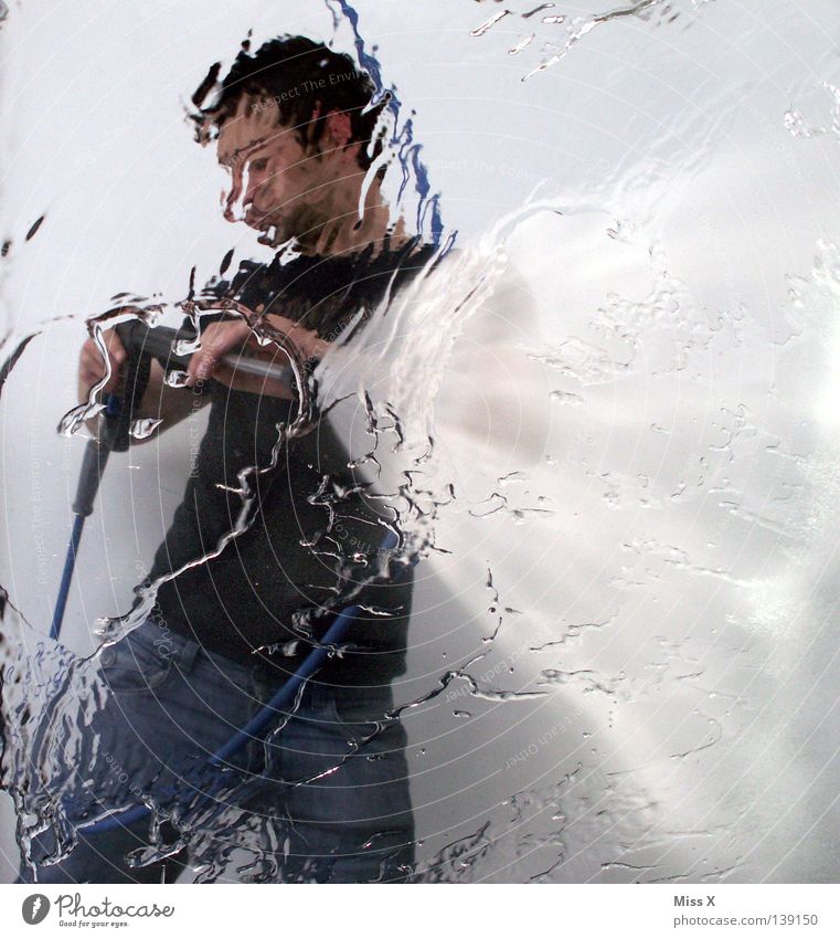 washing day Colour photo Man Adults Water Drops of water Car Cleaning Fresh Wet Blue Gray Black White Laundry Washing day Fellow Car wash service Window pane