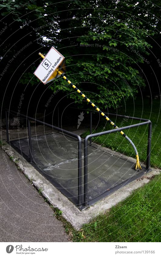 slanting position Stand Transport Yellow Shaft Closed Barrier Meadow Green Force Street sign Signage Signs and labeling Respect street Handrail Nature Contrast