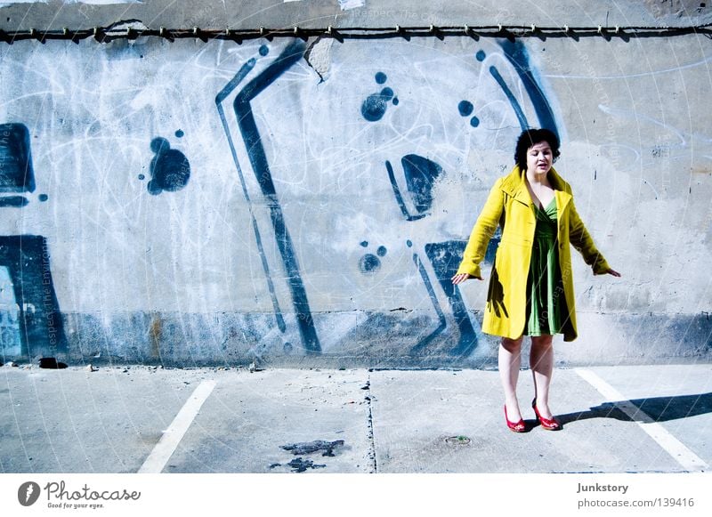 Jump! Coat High heels Woman Going Wall (building) Wall (barrier) Concrete Red Black Yellow Green Neon light Style Self-confident Turnaround Clothing Walking