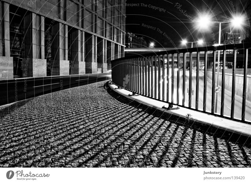 Floodlight B. Light Fence Rod Wall (barrier) Sidewalk Concrete Building Alexanderplatz Night Calm Loneliness Deserted Ghost town Society Tar