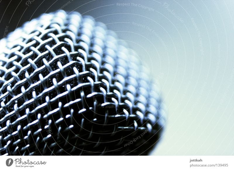 Close-up of a microphone Net Microphone Loud Volume Grating Meaning Voice Speaking tube Remark Comment Speech Freedom of speech Communication