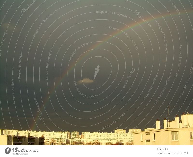 Rainbow over the ghetto. Town Vacation & Travel Gray Dark Gale Dreary Vantage point Awareness Clouds Lyon France Concrete Prefab construction High-rise Ghetto