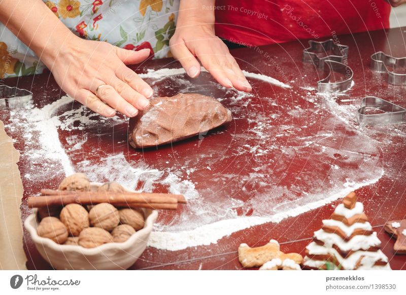 Woman making dough for a Christmas cookies Table Kitchen Human being Adults Hand 2 8 - 13 years Child Infancy 30 - 45 years Make Flour Gingerbread Home-made