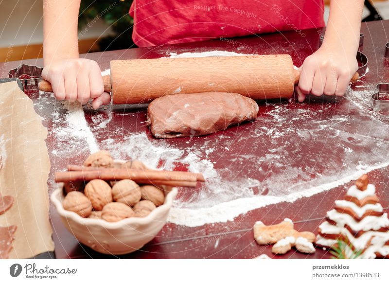 Girl making dough for a Christmas cookies Table Kitchen Human being Hand 1 8 - 13 years Child Infancy Make Flour Gingerbread Home-made knead Preparation