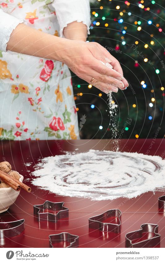 Woman preparing to baking Christmas cookies Table Kitchen Human being Adults Hand 1 30 - 45 years Make Cut Flour Gingerbread Home-made Preparation Colour photo