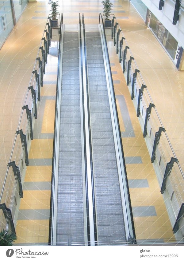 3 floor view Escalator Moving pavement Yellow White Architecture Handrail Above Metal