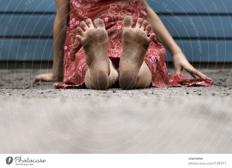 Summer feet Colour photo Exterior shot Day Child Human being Girl Feet 3 - 8 years Infancy 8 - 13 years Dress Sit Dirty Blue Red Toes Splay Children's foot muff