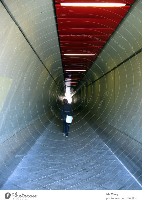 Le tunnel Tunnel Concrete Walking Gloomy Gray Red End Berlin Oval Sparse Paving stone Light Reflection Tunnel lighting Passage Far-off places
