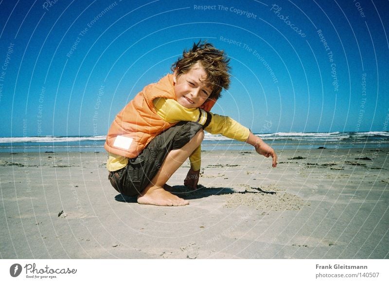 colors Ocean Blue Vacation & Travel Sand Beach Travel photography Boy (child) Laughter Child Gale Wind North Sea Beautiful weather Blue sky Coast Laugh child