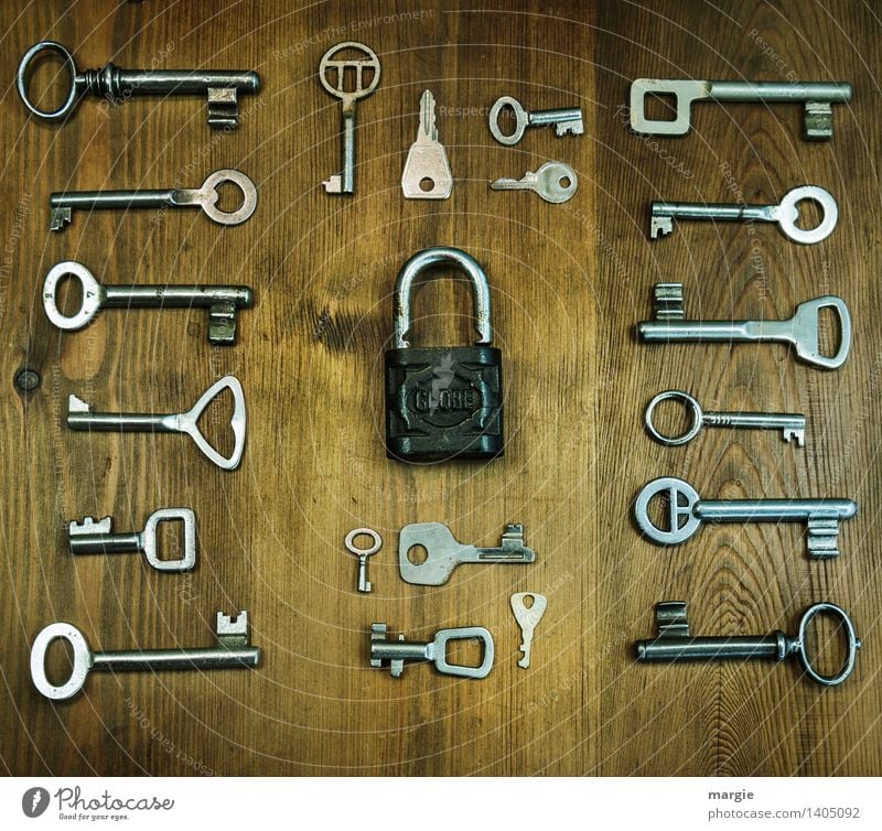 One fits! Many different keys are arranged around a curtain - lock Profession Craftsperson Locksmith Metalworking shop Services Tool Technology Wood Key Brown