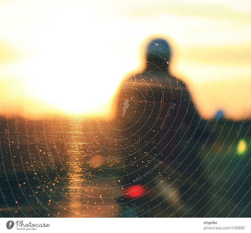 Scooter driving Driving Helmet Blur Glass Scratch mark Vehicle Man Rear view mirror Sun Sunset Rear light Slowly Speed Sky Red Yellow Back-light Dark Evening