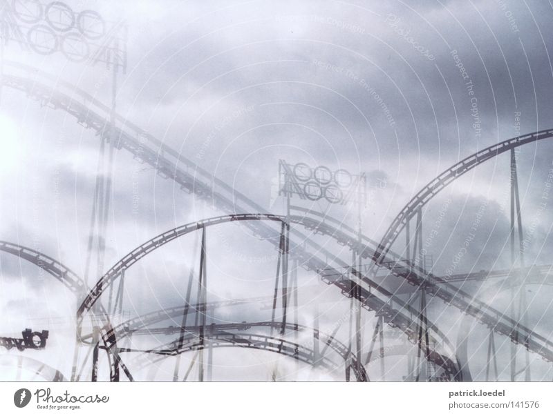 [HH08.2] Dizziness Roller coaster Fairs & Carnivals Vertigo Fear Driving Clouds Joy Panic Dome Freedom Exterior shot triple exposure Playing Share