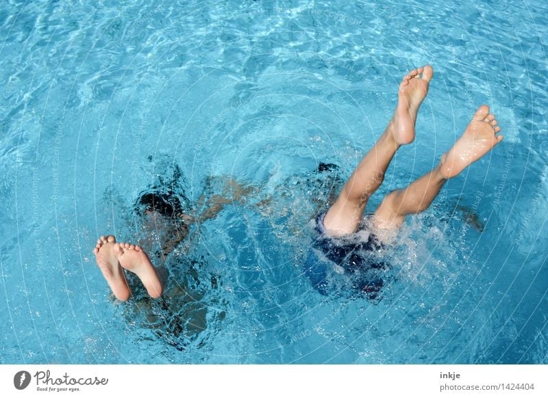 Three young women diving in the pool - a Royalty Free Stock Photo from  Photocase