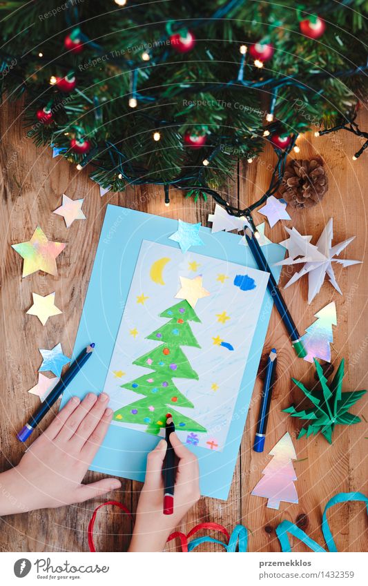 Girl drawing Christmas card with pine tree Handcrafts Decoration Table Christmas & Advent Scissors 1 Human being Tree Paper Wood Ornament Creativity Card