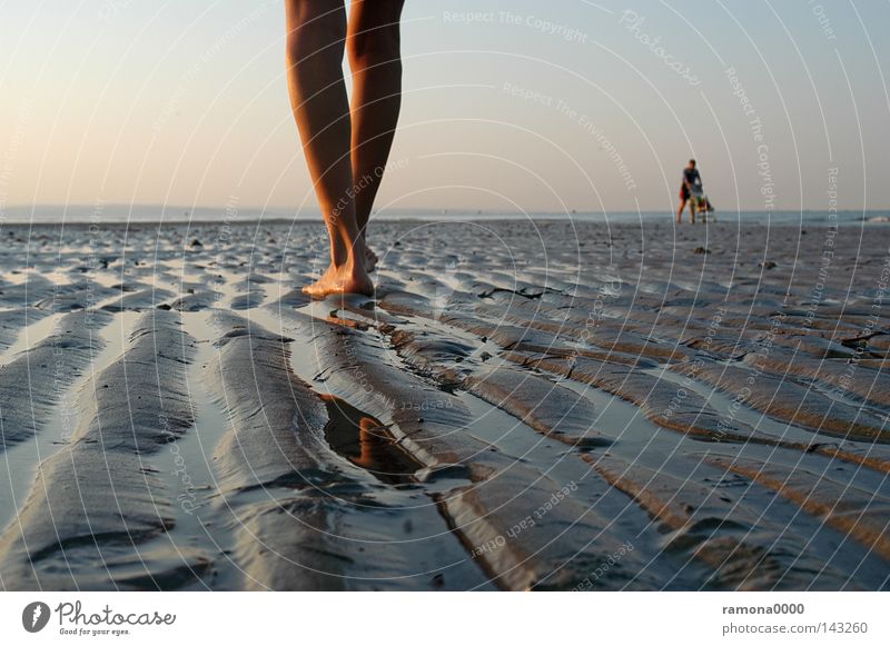 foot by foot Italy Vacation & Travel Sand Beach Ocean Water Sky Sunrise Feet Legs Human being Woman Baby carriage Furrow Water line Stand Calm To go for a walk