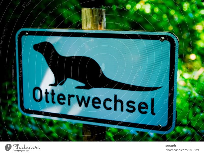 Otter Pictogram Symbols and metaphors Street sign Road sign Information Signage Rectangle Graphic Letters (alphabet) Typography Tin plate sign Strange