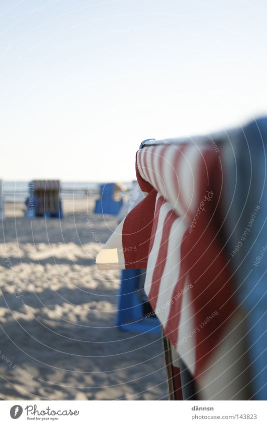 basket rim Relaxation Well-being Pleasant Summer Sun Ocean Beautiful weather Baltic Sea North Sea Beach Sand Stripe Red White Blue Tourist