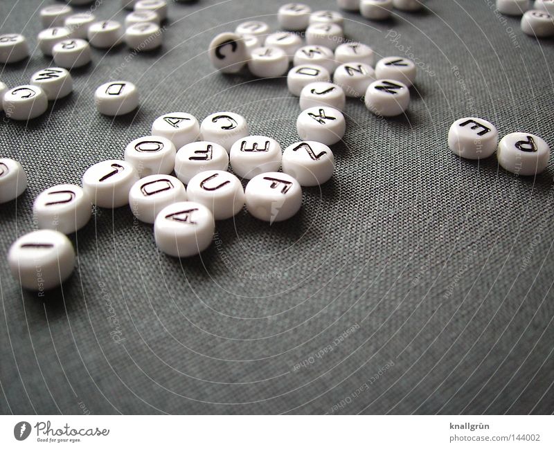 muddle Latin alphabet Letters (alphabet) Capital letter White Black Gray Round Word Thought Characters Obscure Pearl alphabet beads Write Jump sentences