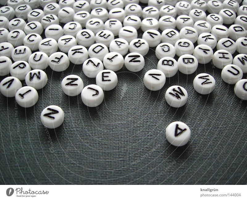 vocabulary Latin alphabet Letters (alphabet) Capital letter White Black Gray Round Word Thought Characters Obscure Pearl alphabet beads Write Jump sentences