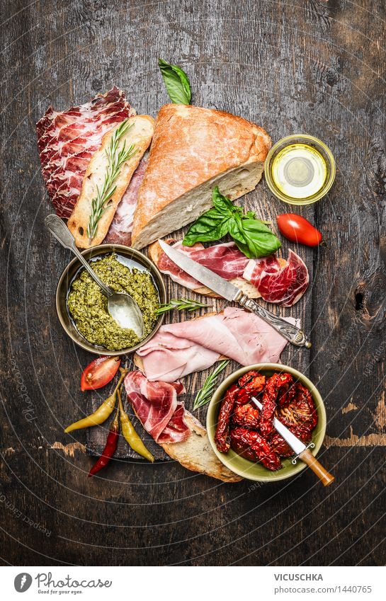 Italian meat platter with antipasti and ciabatta bread Food Meat Sausage Vegetable Herbs and spices Cooking oil Nutrition Buffet Brunch Picnic Italian Food Bowl