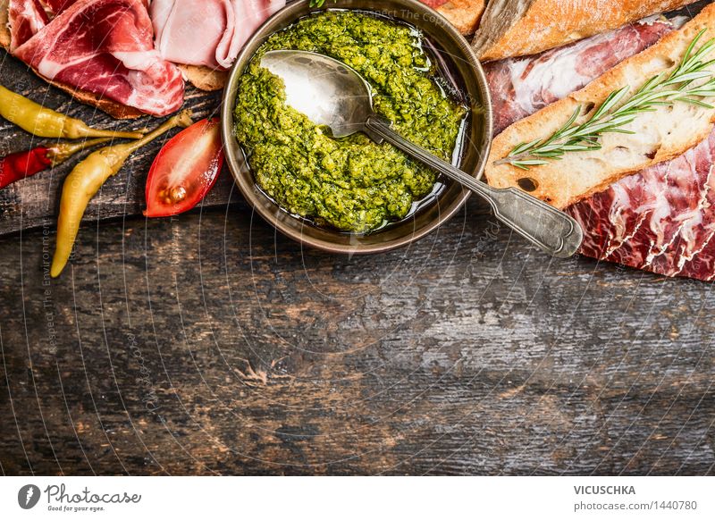 Green pesto and meat platter with bread and antipasti Food Meat Sausage Vegetable Bread Herbs and spices Cooking oil Nutrition Lunch Dinner Banquet Italian Food