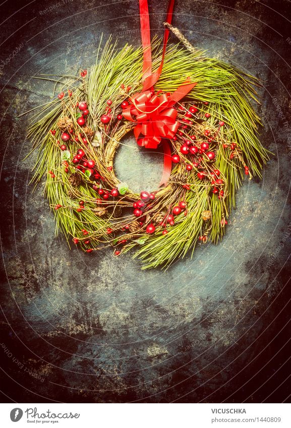 Christmas wreath made of fir branches and red winter berries Style Design Winter House (Residential Structure) Decoration Feasts & Celebrations