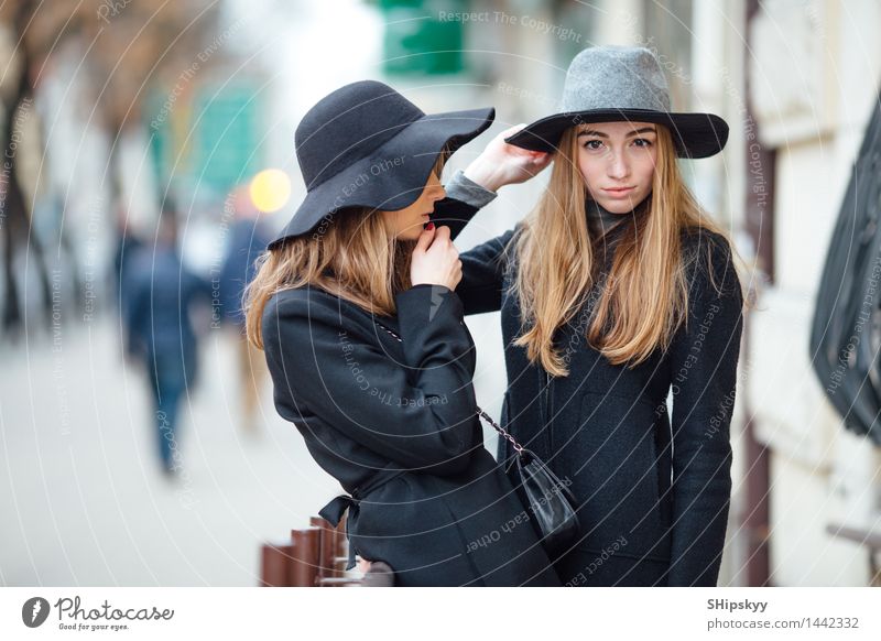 Two girls standing on the street and talking Young woman Youth (Young adults) Brothers and sisters Friendship Life Face 2 Human being 18 - 30 years Adults
