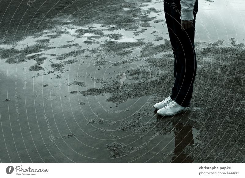 no sports Puddle Footwear Sand Rain Wet Jeans Legs Stand Woman Contrast Dirty Gray Reflection Trouser leg Water puddle Bad weather Rainwater Gloomy 1 Person