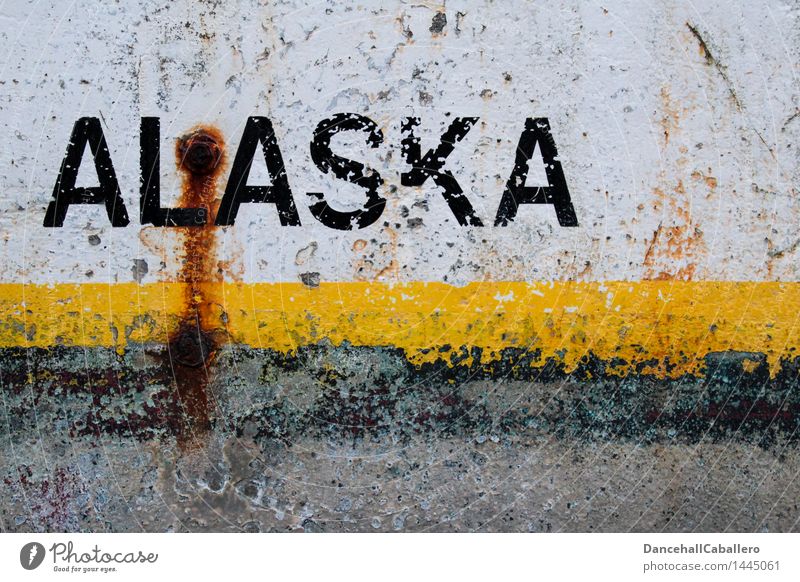 Alaska Vacation & Travel Tourism Metal Steel Rust Characters Graffiti Stripe Old Dirty Broken Trashy Town Yellow Black White Art Decline Varnish Flake off
