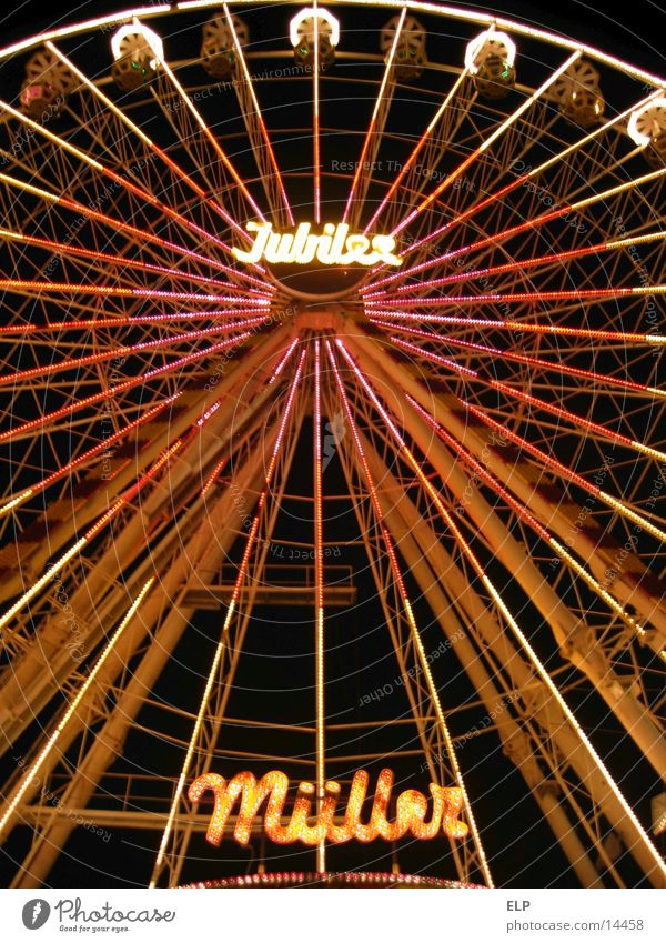 Ferris wheel Fairs & Carnivals Night Showman Leisure and hobbies Light Joy travelling people Tall