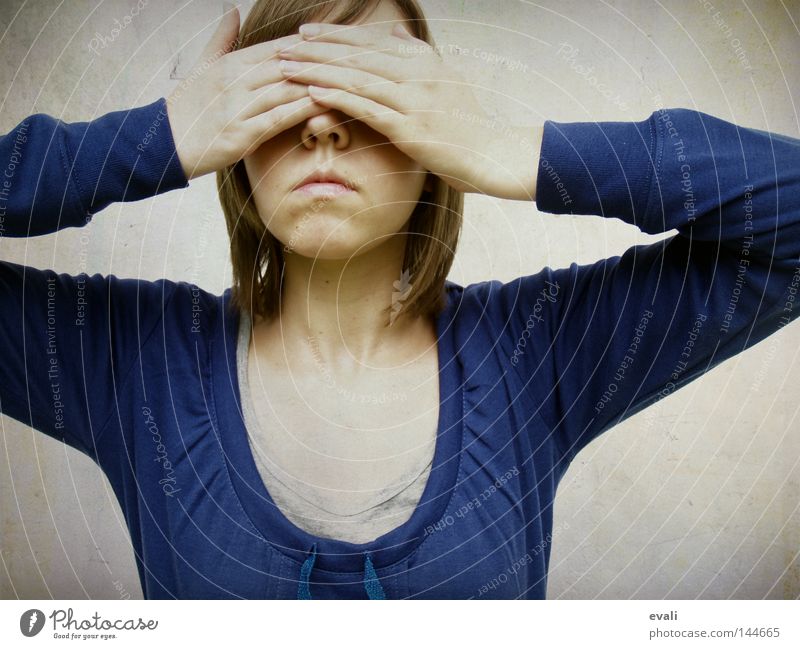 Woman with her hands over her face - a Royalty Free Stock Photo from  Photocase