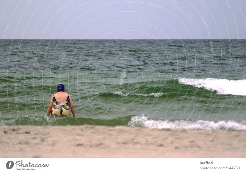 End of the bathing season Ocean Swimming & Bathing Baltic Sea Summer Cold Wind Gray Waves Water Blue Green White Woman Bathing cap Swimsuit Freeze Autumn