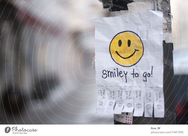 Take a smile 2 Joy Reading Street Piece of paper Lamp post Select Utilize Discover Smiling Laughter Walking Illuminate Fantastic Happiness Happy Funny Positive