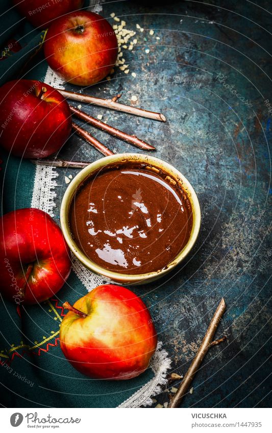 Apples, sticks and melted chocolate Food Dessert Candy Chocolate Nutrition Banquet Organic produce Bowl Style Design Joy Life Party Feasts & Celebrations