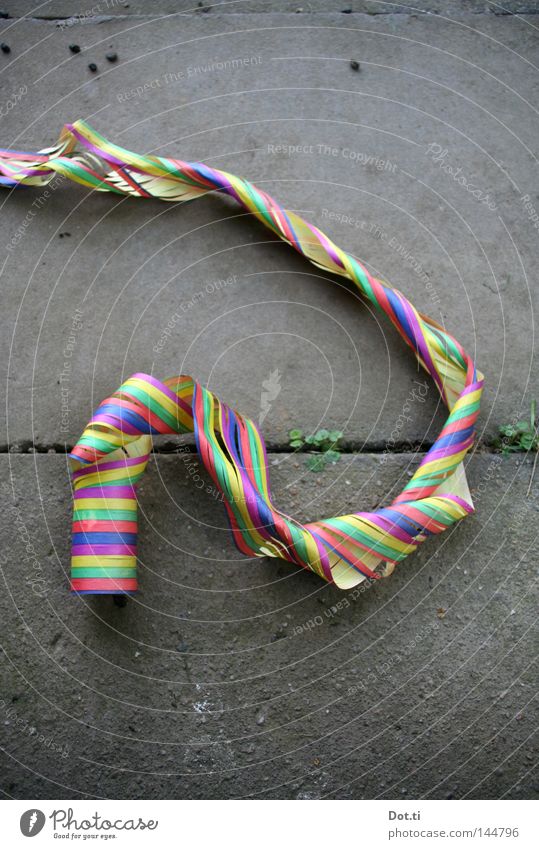 hangover Experimental Blow Paper streamers Paper chain Party Moody Multicoloured Stripe Bend Complicated Muddled Sidewalk Seam Furrow Remainder Trash Dispose of