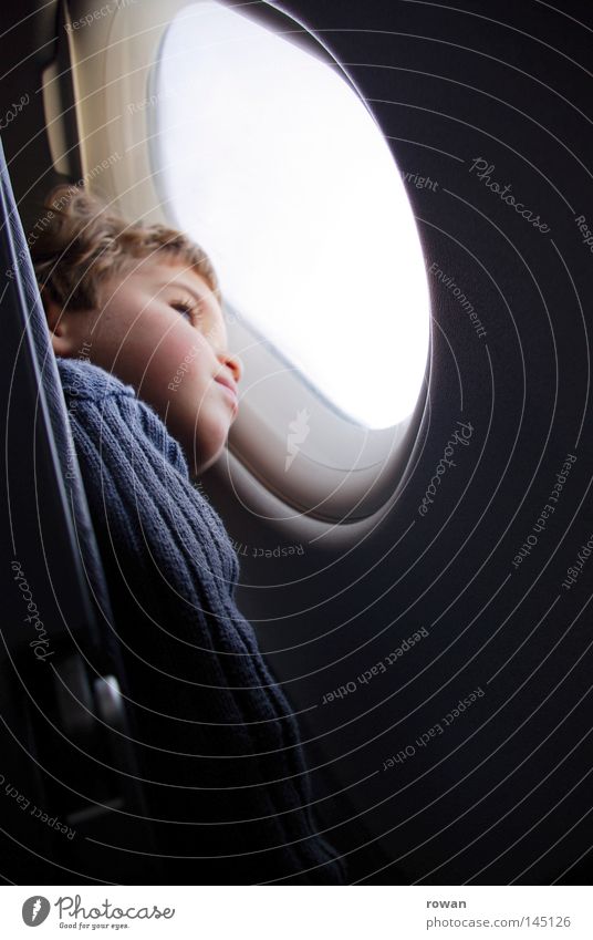 outlook Child Flying Airplane Think Reflection Sky Window Looking Vacation & Travel Dream Wanderlust Far-off places Loneliness Boy (child) Tall Vantage point