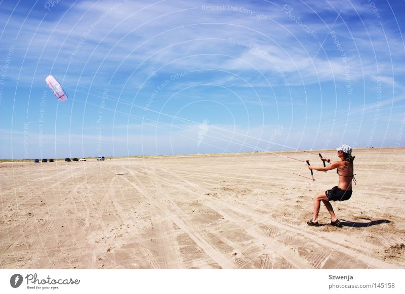 steadfast Colour photo Exterior shot Day Far-off places Summer Beach Woman Adults Clouds Wind To hold on Flying Romp Strong Blue Rømø Sky blue Funsport Dragon