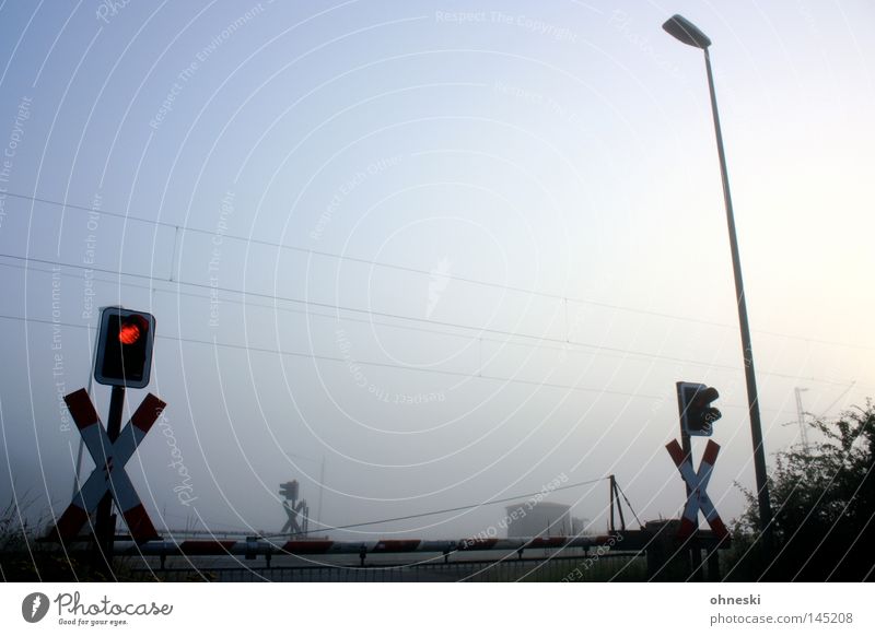 Closed early Railroad crossing Traffic light Fog Sky Morning Control barrier Lantern Lamp Bushes St. Andrew's Cross Peace Calm Summer Overhead line Street sign