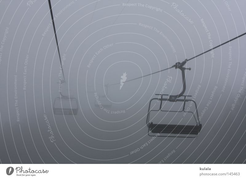 Chairlift ride in the fog Calm Trip Mountain Hiking Chair lift Nature Drops of water Sky Autumn Weather Bad weather Fog Cable car Creepy Cold Gray Dreary Damp