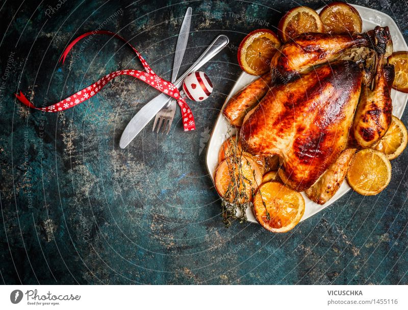 Roasted chicken with oranges for Christmas table Food Meat Orange Herbs and spices Nutrition Dinner Banquet Business lunch Organic produce Plate Fork Spoon