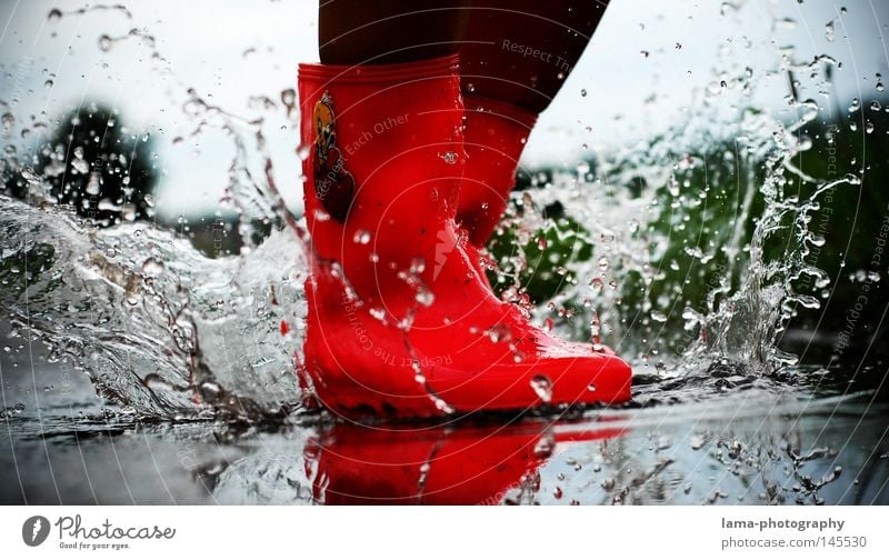 autumn stories Rubber boots Boots Puddle Inject Drops of water Rain Storm Wet Effervescent Rainwater Dirty Autumn Moody Pink Red Jump Hop Playing Reflection Mud