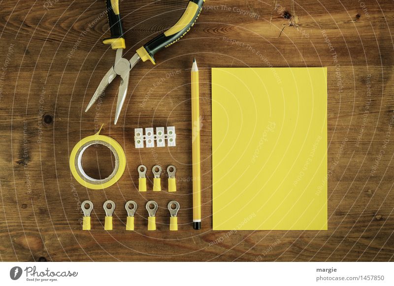 Yellow current: yellow writing paper with pencil and electrical utensils such as insulating tape, lyster clamps and pliers Work and employment Profession