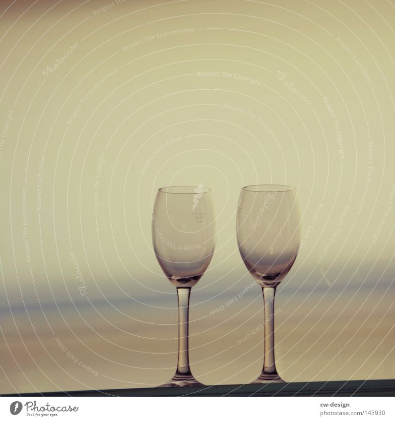 HIGH THE CUPS - ON LA CHAMANDU Color gradient Exterior shot Wine glass 2 Isolated Image Bright background Copy Space top Copy Space left In pairs Horizon Ocean